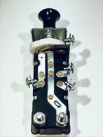 Universal headlight switch with circuit breaker