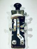 Universal headlight switch with circuit breaker